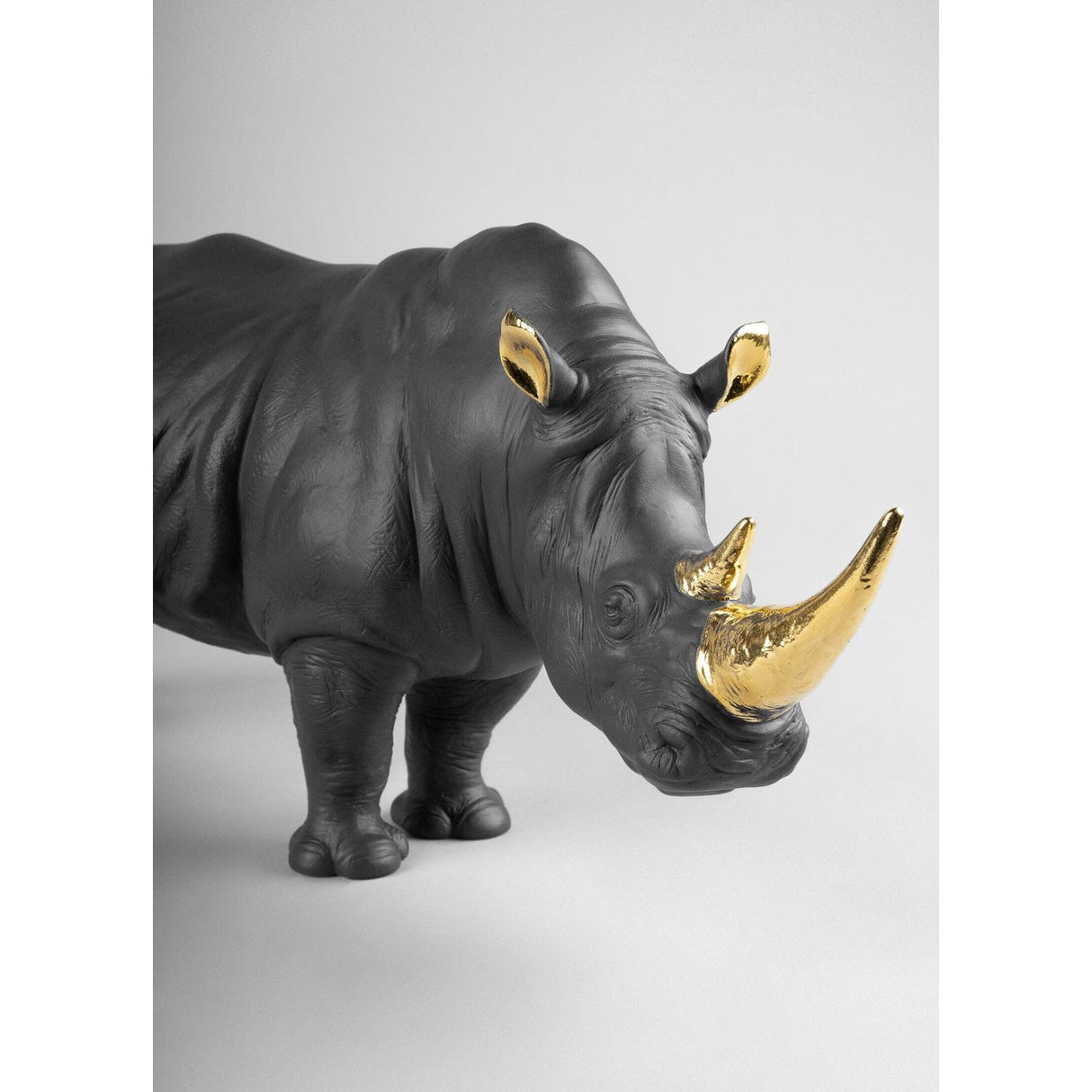 LLADRO' Scultura Rinoceronte Nero Oro Serie Limitata 22x45cm Porcellana