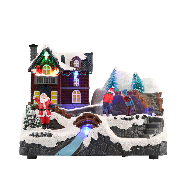 Villaggio di Natale Timstor in resina con Babbo Natale e movimento 19x13 cm