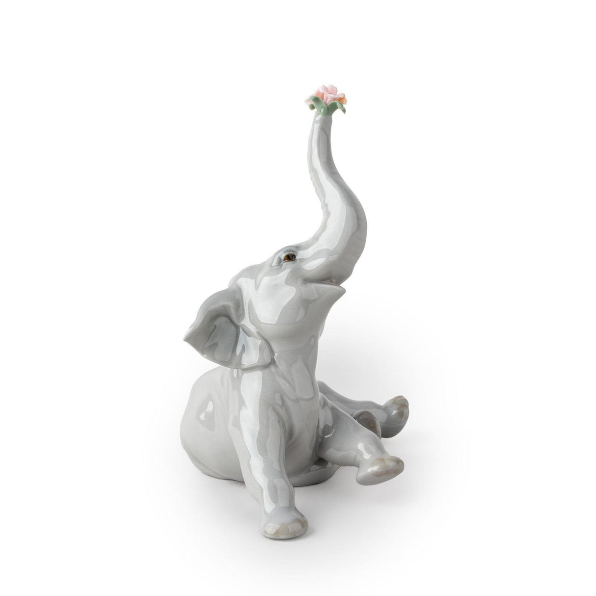 Statuina Elefante Bebè con Fiore Lladrò in porcellana lucida 14x12x10 cm