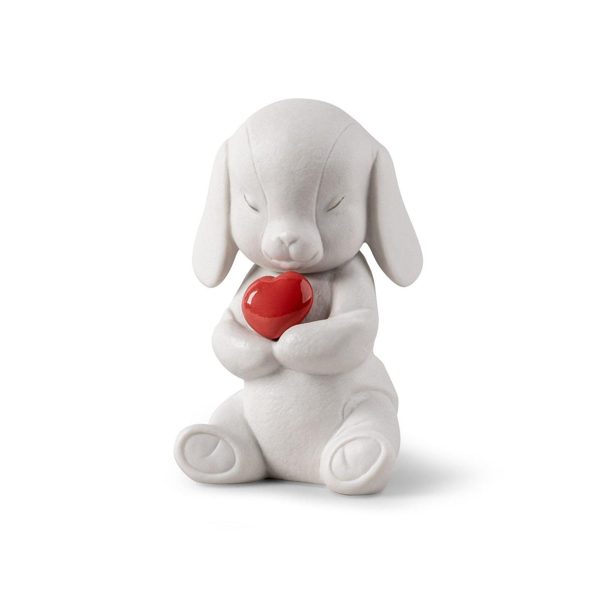 Statuetta Buddy Cucciolo Lladrò in porcellana bianca 13x8 cm