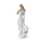 Statuina Donna Il Sussurro dei Fiori Lladrò in porcellana lucida 37x14 cm