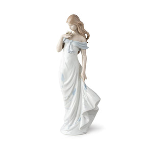 Statuina Donna Il Sussurro dei Fiori Lladrò in porcellana lucida 37x14 cm