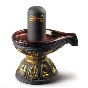 Scultura Lingam Lladrò in porcellana con dettagli in oro 24x21 cm