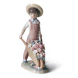 Statuina Bimbo con Fiori Lladrò in porcellana lucida 23x14 cm