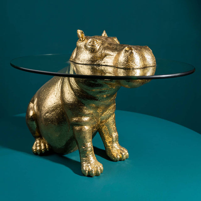 Tavolino ippopotamo Werns in resina dorata con piano in vetro 45x64 cm