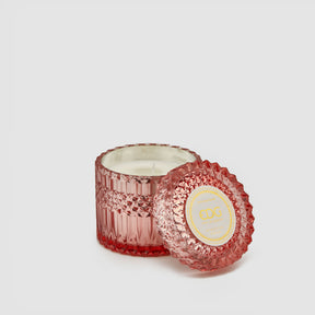 Candela profumata Crystal EDG in vetro rosa e cera 10,5 cm