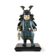 Statuina Bambino Samurai Lladrò in porcellana blu e argento 36x21 cm