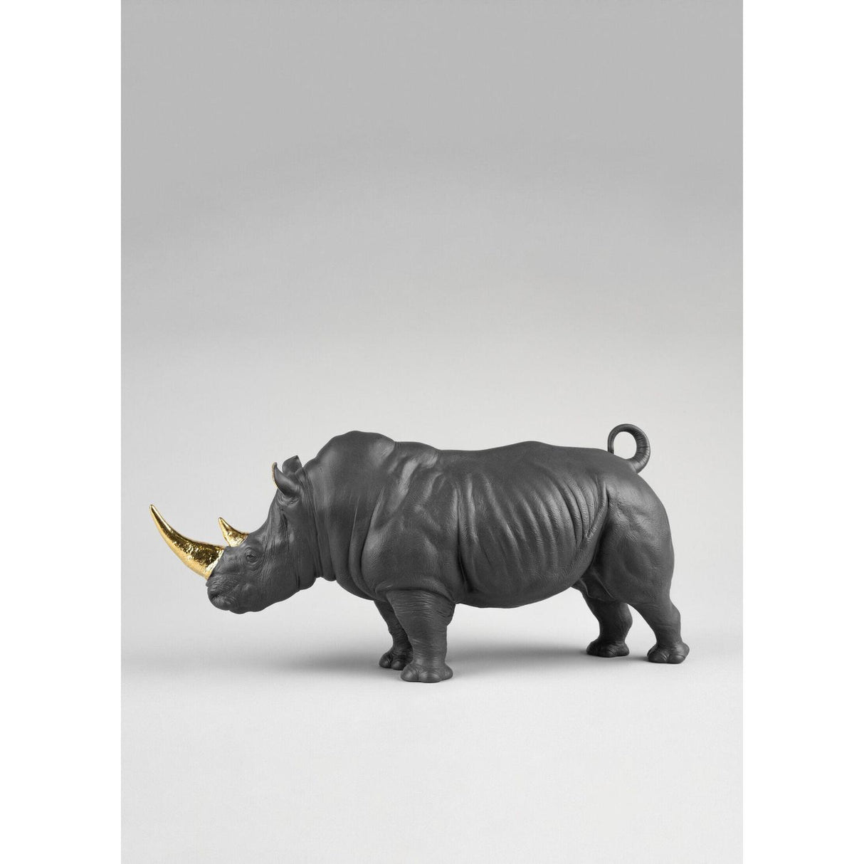LLADRO' Scultura Rinoceronte Nero Oro Serie Limitata 22x45cm Porcellana