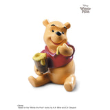 Scultura Winnie the Pooh Lladrò in porcellana 15x12 cm Disney