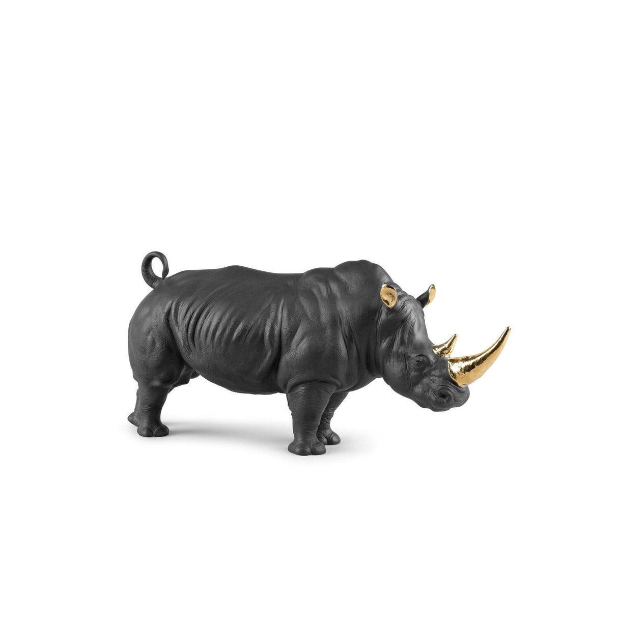Scultura rinoceronte Lladrò in porcellana nera opaca e dettagli oro 22x45 cm