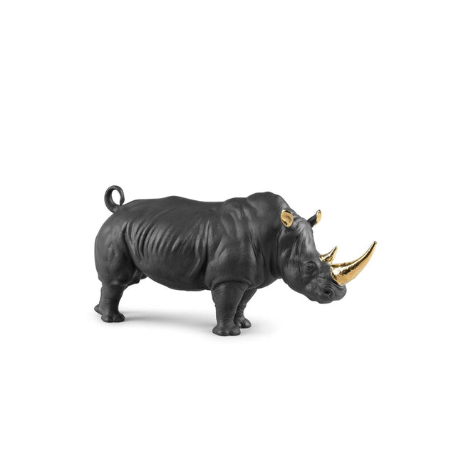 Scultura rinoceronte Lladrò in porcellana nera opaca e dettagli oro 22x45 cm