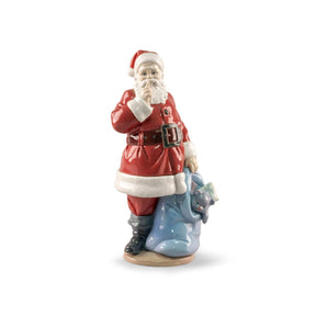 Scultura Babbo Natale Lladrò in porcellana smaltata dettagliata 33x17 cm