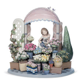 Scultura Donna Fiorire Romantico Lladrò in porcellana decorata 30x32 cm
