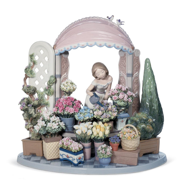 Scultura Donna Fiorire Romantico Lladrò in porcellana decorata 30x32 cm