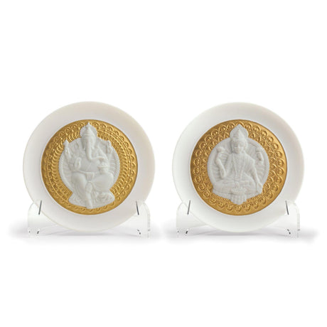 Piatti decorativi Lladrò Lakshmi e Ganesha in porcellana opaca con bordo oro