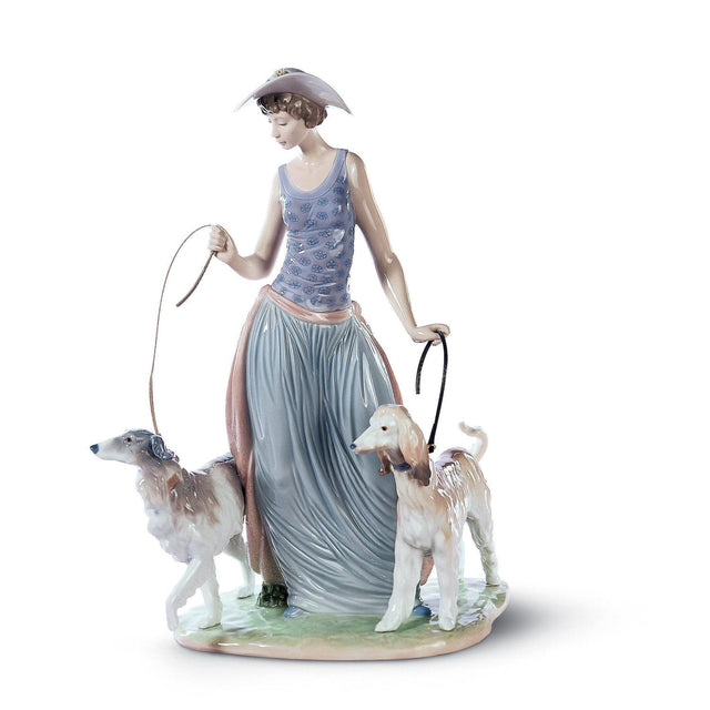 Statuetta Dama con cani Lladrò in porcellana tonalità pastello 39x23 cm