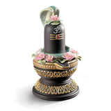 Statuetta Lingam Lladrò in porcellana con dettagli in oro 18x12 cm