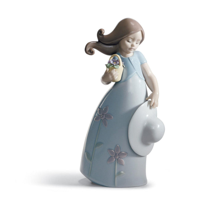 Statuina Bimba con fiori Lladrò in porcellana lucida 17x9 cm