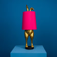 Lampada da tavolo Hiding Bunny Werns in poliresina oro e magenta 24x74 cm