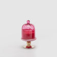 Candela profumata EDG su alzata in vetro fucsia 16x9 cm
