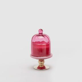 Candela profumata EDG su alzata in vetro fucsia 16x9 cm