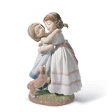 Statuetta Abbracciami Lladrò in porcellana lucida 20x12 cm