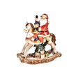 Statuina Babbo Natale su cavallo a dondolo Bianchi Dino in porcellana 25cm