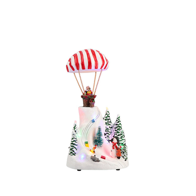 Villaggio di Natale Timstor animato con LED e Babbo Natale paracadutista 35 cm
