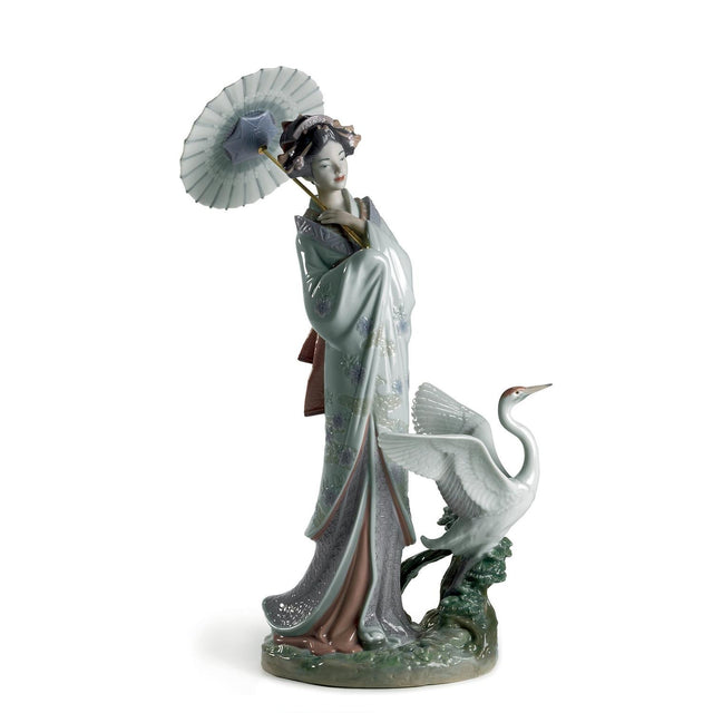 Statuina donna con ombrello Lladrò in porcellana decorata 39x25 cm