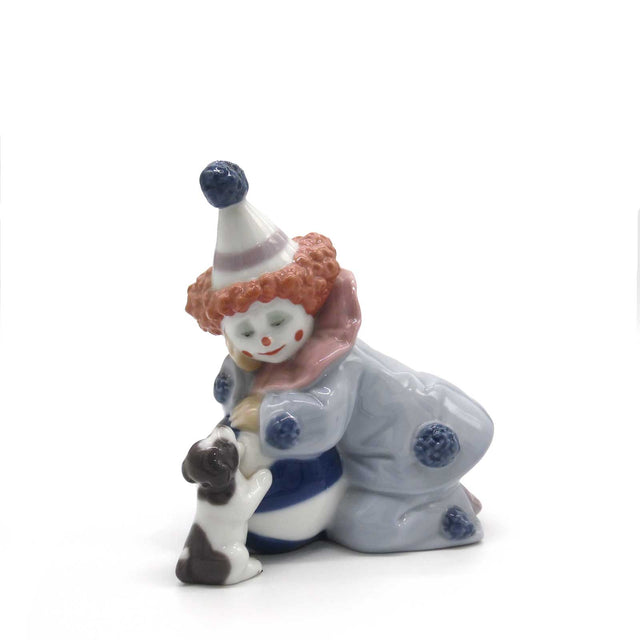 Statuina Pierrot con cagnolino Lladrò in porcellana brillante 10x11 cm