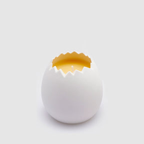 Candela profumata uovo EDG in ceramica gialla 8x8 cm