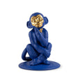 Scultura Scimmia Lladrò in porcellana blu opaco con dettagli in oro 23x17 cm