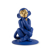 Scultura Scimmia Lladrò in porcellana blu opaco con dettagli in oro 23x17 cm