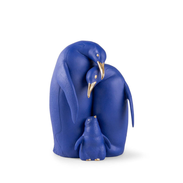 Famiglia di pinguini Lladrò in porcellana blu elettrico e oro 25x16 cm